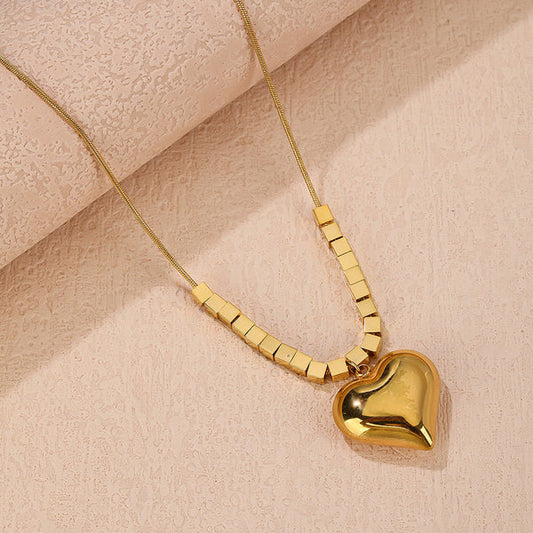 Gold-Plated Anti Tarnish Golden Cubes & Heart Glow Pendant